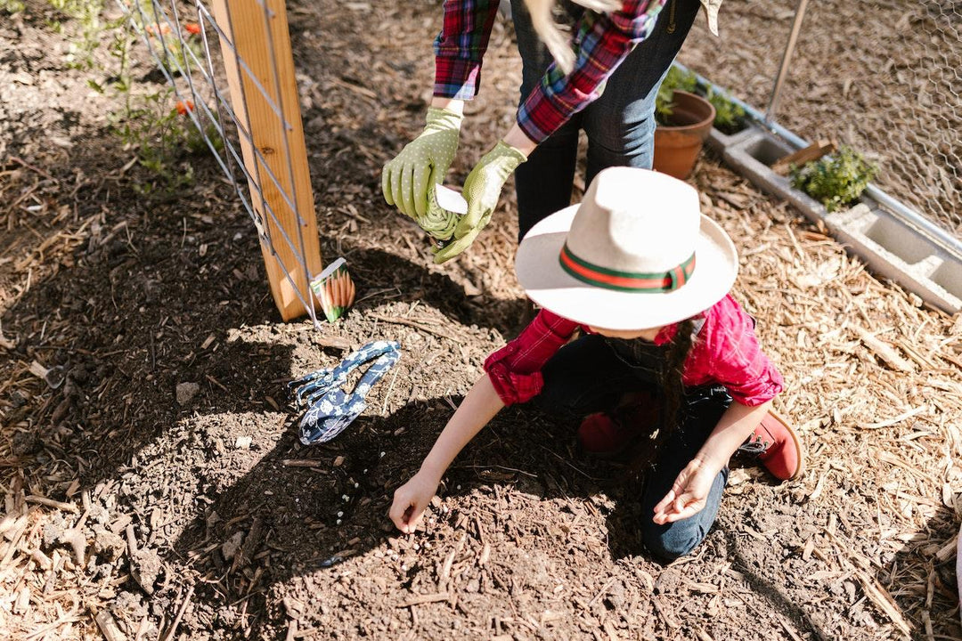 mother and child planting seeds